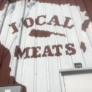 a sign on the side of a building