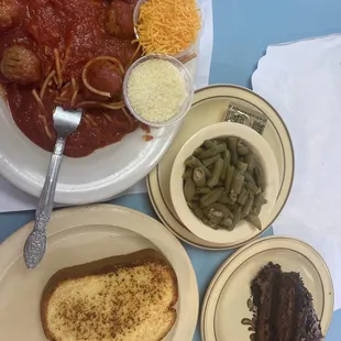 Spaghetti &amp; meatballs, green beans &amp; garlic bread.  Chocolate cake