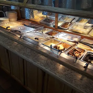 More buffets! I count about 5 hugh section of buffet of food all having a wide variety of food different from the other buffet tables