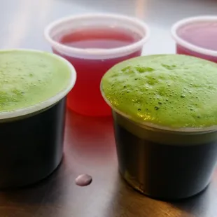 Enjoying two shots of Wheatgrass with raspberry juice chasers.  Very healthy!