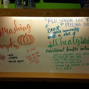 a whiteboard with writing on it