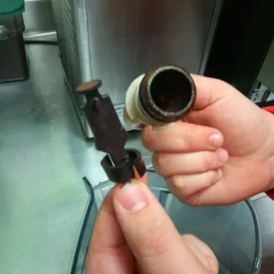 Before and after cleaning the spigot.