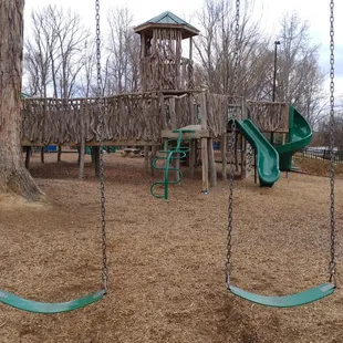 Swings and playground at Kevin Loftin Riverfront Park