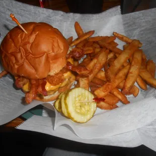 FPC Burger. Half-pound burger, American cheese, bacon, tater tots, fried egg, chipote mayo with side of fries. $5.00 on Wednesday.