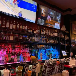 a bar with a lot of sports memorabilia