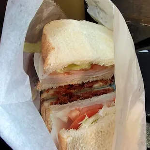 a sandwich in a paper bag
