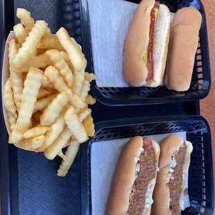 two hot dogs and french fries