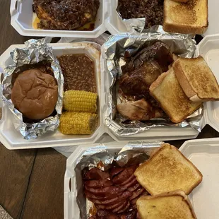 Loaded potato, 1/2 pound chopped bbq, dinner plate, chicken quarters and sausages