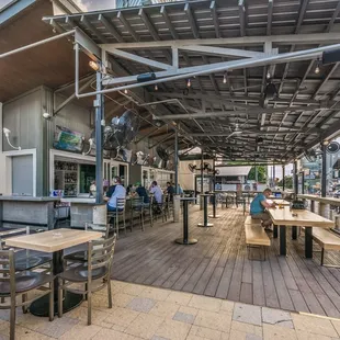 outdoor seating area with tables and chairs