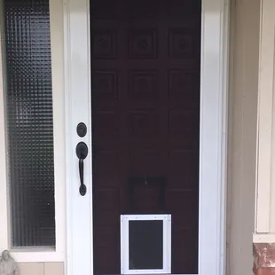 My security screen door with pet door feature.