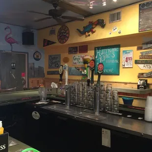 a bar with a variety of drinks
