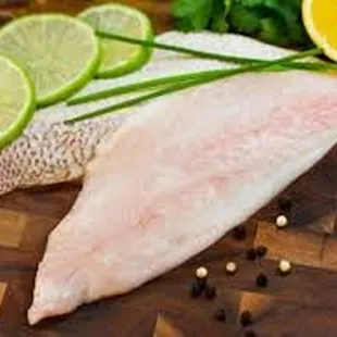 fish fillets on a cutting board