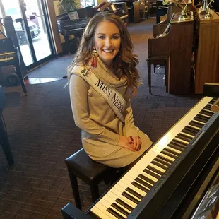 Miss Nebraska playing in our store on the Yamaha  Clavinova.