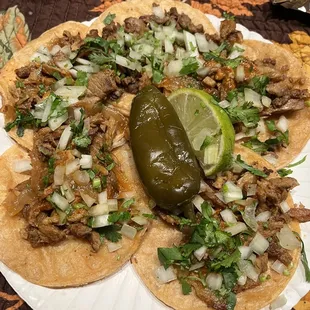 Asada and al pastor tacos.