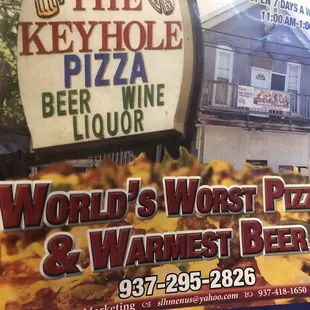 a sign for the keyhole pizza liquor