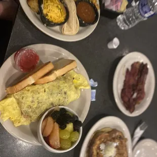 #11. Meat Lover Omelet, Huevos Rancheros, Fruit Cup Cinnamon French Toast