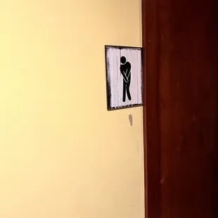 a restroom sign