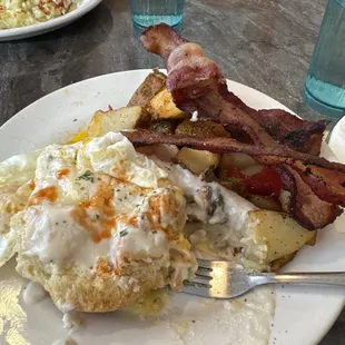Biscuits and gravy American potatoes eggs with bacon!! ‍