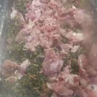 meat being cooked in a pan