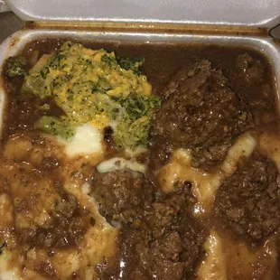 Meatloaf,mashed potatoes and broccoli &amp;cheese, the plate spill from my driving $4.99