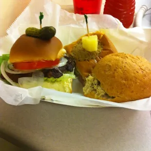 Triple slide:  grandma's burger, rosemary chicken, &amp; hot Hawaiian.