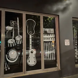 a guitar shop window display
