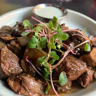 Steak bites with mushrooms.