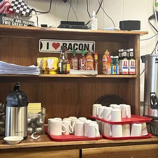 a coffee station with a variety of items