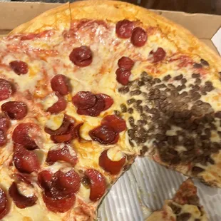 a pepperoni pizza in a box