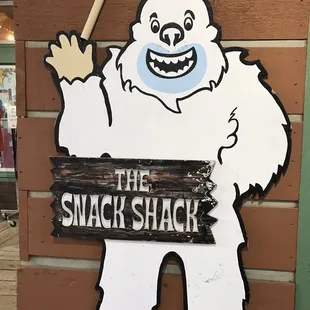 a sign for the snack shack