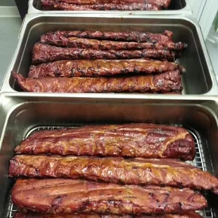 In season.  Weather permitting.  Hickory smoked baby back ribs.