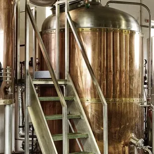 a row of copper tanks