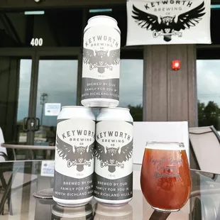 a can of beer and a glass of beer