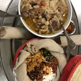 a bowl of soup and a plate of food