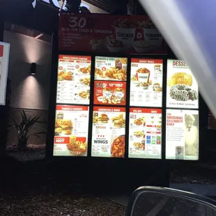 a restaurant with menus on the wall