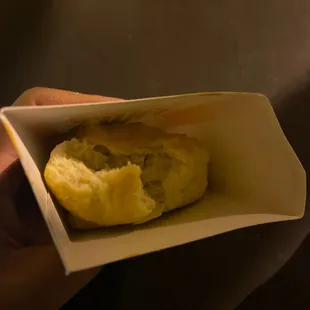 Biscuit that he smashed with his hand as he was putting it in the bag.