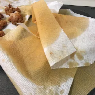 This is just some of the grease. There was a half inch sediment and grease in the bottom of dish. The chicken had an awful taste salad1/2 fu