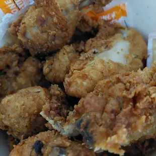 Bucket of dark meat chicken