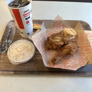 Two piece meal with coke slaw and Pepsi