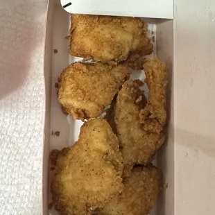 These tiny chicken nuggets are NOT equivalent to two chicken strips. Read my review for the terrible experience that follows.
