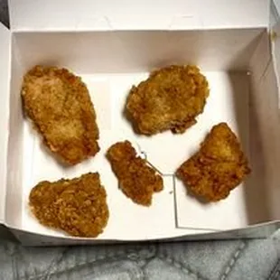 There were a lot more of the size of that smallest one. They were just scraps of skin and breading, but counted as "nuggets".