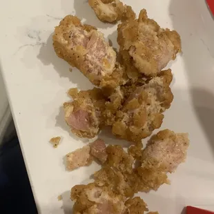 Popcorn chicken box RAW inside. No one&apos;s reaching out after the complain. Insane!!