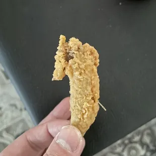 This is considered a hot wing. They counted this as one of the 12 piece.  12 Kentucky Fried Wings