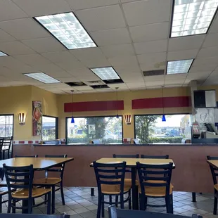 Ceiling panels missing. Chairs closing off area. Possible mold.