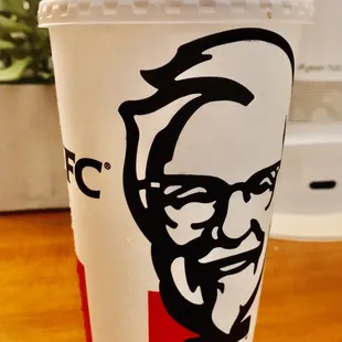 a kfc logo on a coffee cup