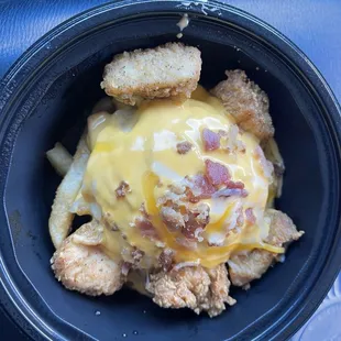 Smashed potato bowl with chicken nuggets