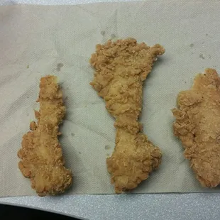 Thin, super dry and small. Nowhere near tender. Check your bag before leaving drive-thru.