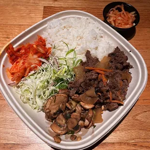 soy ginger beef with kimchi, marinated mushrooms, green onion salad + side of spicy daikon