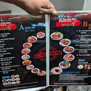 a hand holding a menu for a restaurant