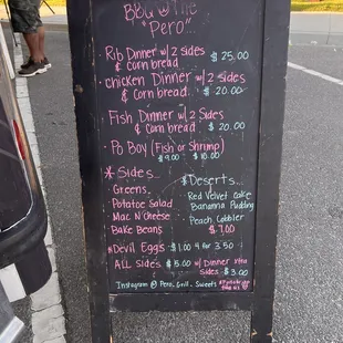a blackboard with a price list on it